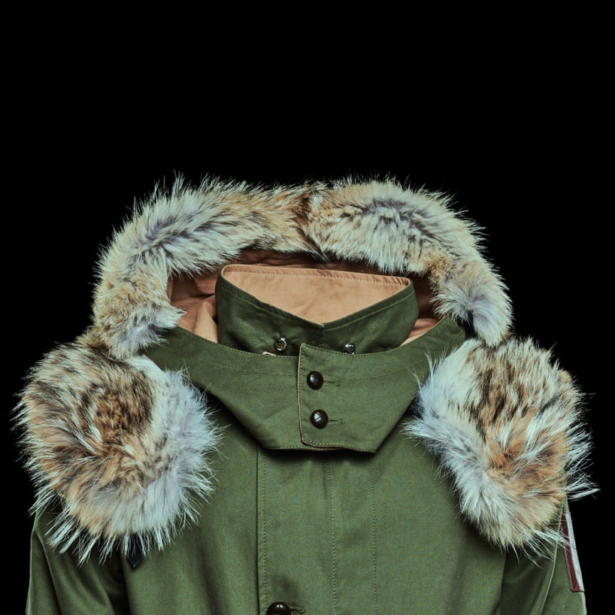 Green parka with koyote fur